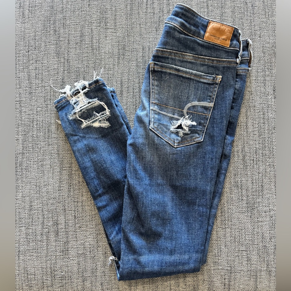 AEO Super Super Stretch Distressed Denim Jeans
